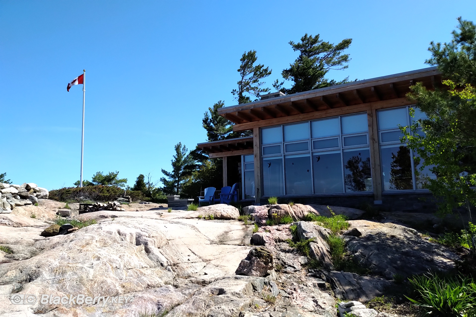 Cognashene Cottage — timber-and-stone cottage on a Georgian Bay granite point